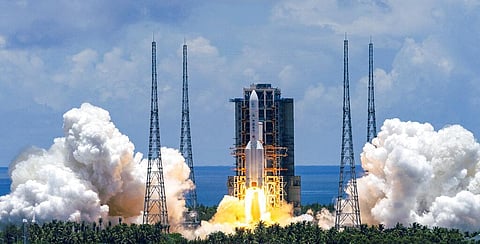 In this photo released by China's Xinhua News Agency, a Long March-5 rocket carrying the Tianwen-1 Mars probe lifts off from the Wenchang Space Launch Center in southern China's Hainan (Photo | AP)