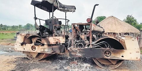 A road roller which was set ablaze by Maoists near Battinapalli village under Cherla mandal in Bhadrachalam Agency area.