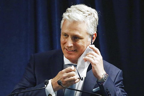 Robert O'Brien, assistant to the president for national security affairs, removes a face covering prior to speaking during a news conference in Phoenix. (Photo | AP)
