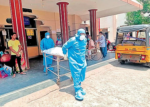 A dead bodybeing shifted to mortuary (Photo | EPS)