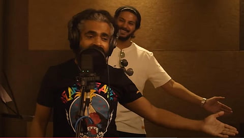 Dulquer Salmaan and Jacob Gregory in 'Unnimaya song'. (Photo | YouTube Screengrab)