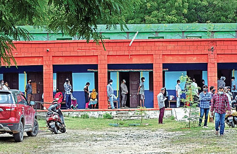 People queue up to get tested for Covid-19 at a government school in Bowenpally, Secunderabad, on Wednesday. Around 60 samples are collected every day at the school-turned-testing centre | S Senbagapa