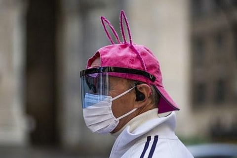 A man wearing bunny ears and face mask in New York City. (Photo | AFP)