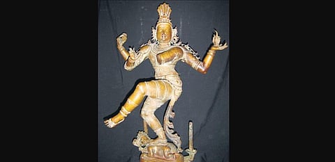Pazhuvur Nataraja who was stolen and exported. His lower left hand was sawn off by robbers who initially believed that the sculpture was made of gold.