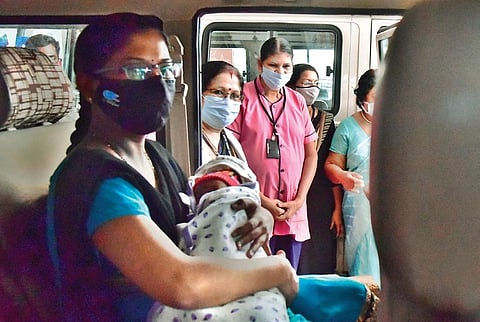 Sudheendra Mission Hospital employees bidding farewell to Gayathri and  her daughter Aradhya in Kochi on Saturday | Albin Mathew