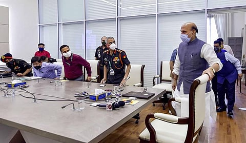 Defence Minister Rajnath Singh arrives as Army Chief General Manoj Mukund Naravane looks on during the virtual inauguration of 6 BRO bridges at Ministry of Defence in New Delhi Thursday July 9 2020. (Photo | PTI)