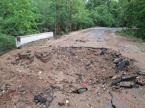 A deep crater-like structure formed on the NH-16 in Bastar after the IED blast triggered by Maoists.