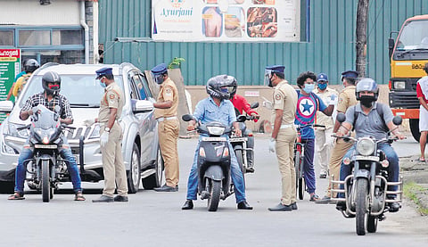 Police officials inspecting vehicles at Thoppumpady | file pic
