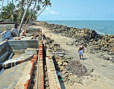 Antony Kuttapassery, a resident of Chellanam, walks through the stretch of his destroyed hatchery, which was destroyed during Ockhi (File photo) A Sanesh