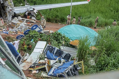The Air India Express flight from Dubai with 190 people, including a six-member crew, overshot the tabletop runway during landing at the Kozhikode airport in heavy rains on Friday. (File Photo | PTI)