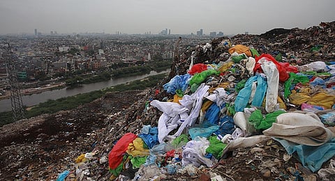 (For representation only) PPE kits and other medical waste from Covid wards and testing centres disposed of at Ghazipur landfill. (Photo | Shekhar Yadav, EPS)
