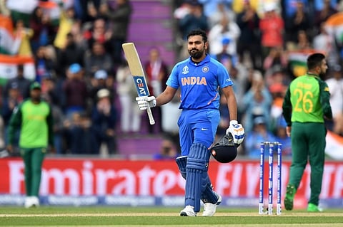 India's Rohit Sharma celebrates reaching his century during the 2019 Cricket World Cup group stage match between South Africa and India. (Photo | AFP)