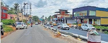 The tarring completed on one side of the NH at Poovanpara in Attingal as part of the road development