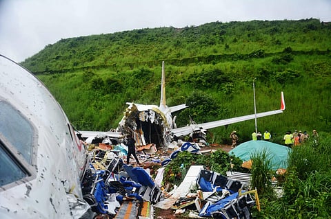 The crashed Air India Express flight at the Karipur International Airport.  (Photo | Manu R Mavelil, EPS)