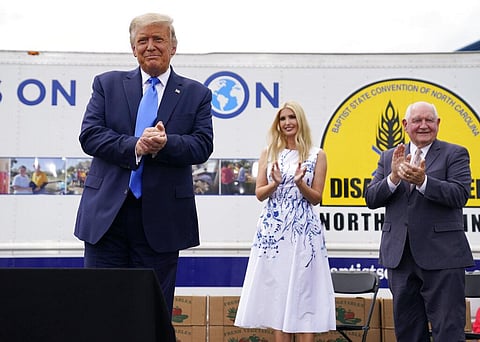 President Donald Trump arrives to deliver remarks on the 'Farmers to Families Food Box Program' (Photo | AP)