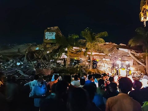 Rescue operations underway after a five-storeyed residential building collapsed in Raigad district of Maharashtra Monday Aug. 24 2020.  (Photo | PTI)