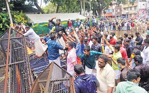 Yuva Morcha activists attempting to breach the barricades erected outside the Secretariat in Thiruvananthapuram on Wednesday