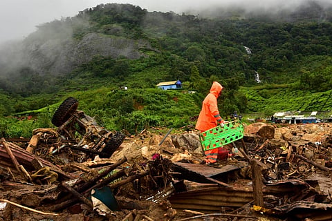 Fire Force and NDRF teams conducting a search operation at Pettimudi near Rajamala in Munnar, where a landslide killed at least 24 people. (Photo | Albin Mathew, EPS) 