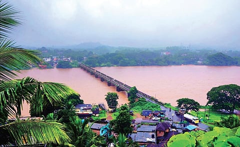 The Netravati river crosses the danger mark following a heavy rainfall on Saturday  | express
