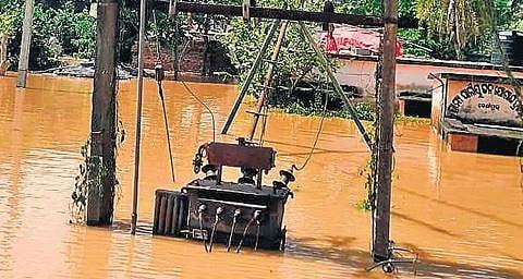 A sub-station submerged in floodwater in Benipur village under Derabishi block | Express