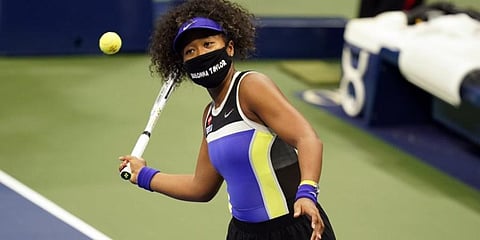 Naomi Osaka wears a mask in honor of Breonna Taylor, during the first round of the US Open. (Photo | AP)