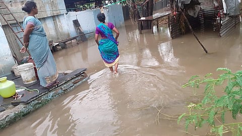 Gandikota reservoir backwater entered houses at Talla Proddaturu village in Kadapa district on Sunday. (Photo | Express)