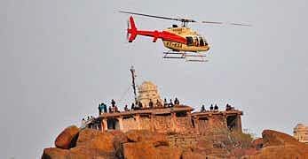A chopper flies over Hampi during the Hampi Festival in 2019 | D Hemanth