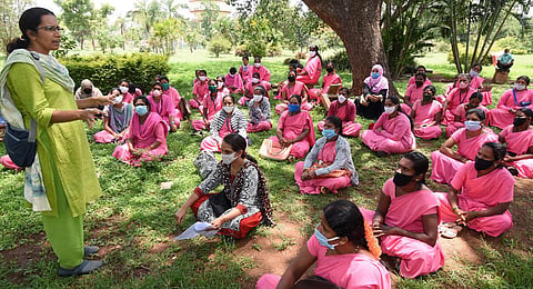 ASHA workers stage a protest . (Photo | Udayshankar S, EPS)