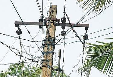 While erecting the cut out, they came in contact with a live electric wire passing over the road and at least six of them suffered electric shock. 