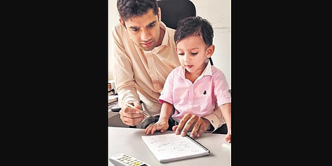 Raghav Himatsingka with his son