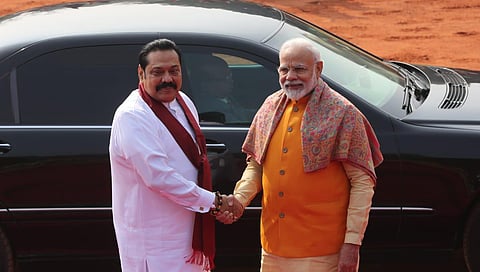 Prime Minister Narendra Modi shakes hands with Sri Lanka's Prime Minister Mahinda Rajapaksa. (Photo | Shekhar Yadav/EP