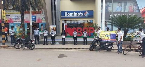 Cyber Rakshak volunteers campaigning in the market place. (Photo | Express)
