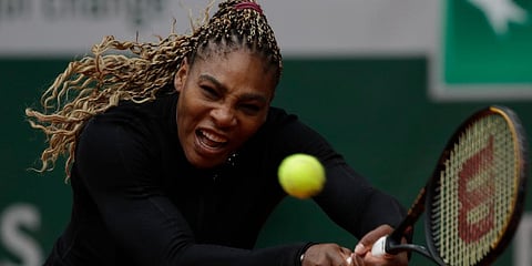 Serena Williams plays a shot against Kristie Ahn in the first round match of the French Open tournament at the Roland Garros stadium in Paris. (Photo | AP)