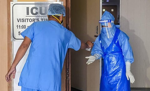 Medics outside the COVID19 isolation ward of the Rajiv Gandhi Super Specialty Hospital in New Delhi. (File Photo | PTI)