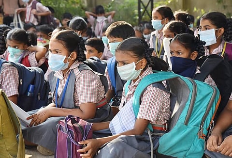 School students wear masks in Visakhapatnam. (File photo | EPS)