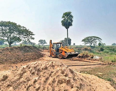 An illegal brick kiln being demolished in a village in Derabishi block on Thursday.