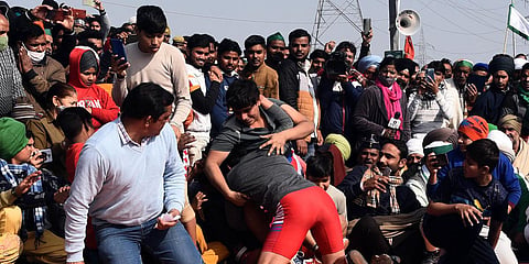 Farmers organize a wrestling competition during their protest against the new farm laws at the Ghazipur border in New Delhi. (Photo| Parveen Negi, EPS)