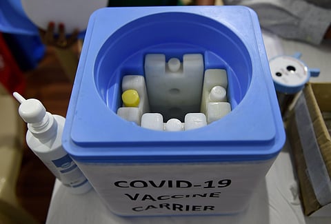 A vaccine carrier box kept inside a booth of a vaccination unit at a COVID-19 center, during a nationwide dry run or mock drill for the COVID-19 vaccine. (File Photo | PTI)