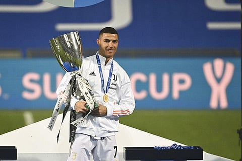 Juventus' Cristiano Ronaldo celebrates following the Italian Super Cup final soccer match between Juventus and Napoli  (Photo | AP)