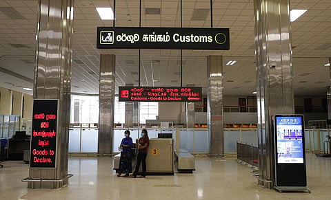 Sri Lankan passengers wait at the customs desk upon after their arrival Katunayake International Airport in Colombo, Sri Lanka. (Photo | AP)