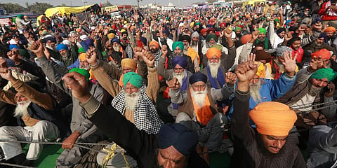 Farmers shout slogans during their protest against the new farm laws at Singhu border in New Delhi. (Photo | Shekhar Yadav, EPS)