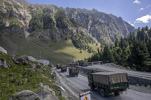 In this Sept. 9, 2020, file photo, an Indian army convoy moves on the Srinagar- Ladakh highway at Gagangeer, northeast of Srinagar. (Photo | AP)