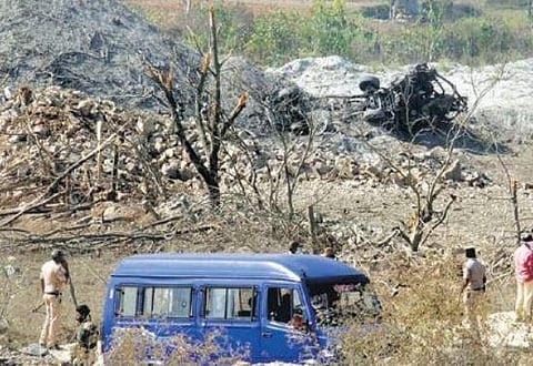 Police officers investigate the blast site near Shivamogga on Friday. (Photo| Shimoga Nandan, EPS)