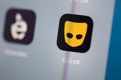 Logo of the US social networking application Grindr on the screen of a tablet. 