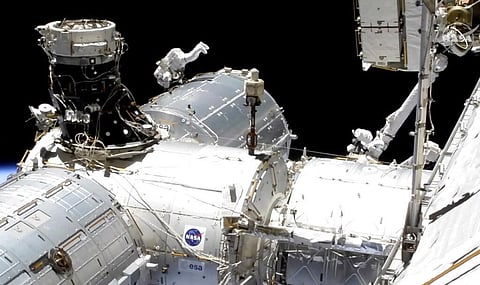 NASA astronaut Mike Hopkins works outside the International Space Station’s European lab. (Photo | AP)