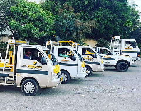 Two trucks of Ready Assist.
