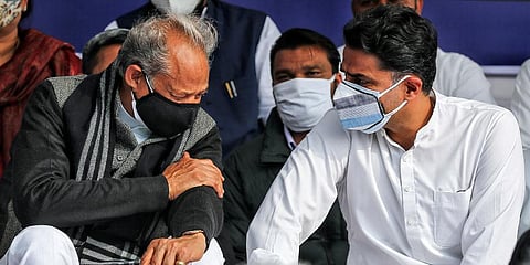 Rajasthan CM Ashok Gehlot with senior Congress leader Sachin Pilot during a protest against the Centre's new farm laws at Shahid Smarak in Jaipur. (Photo | PTI)