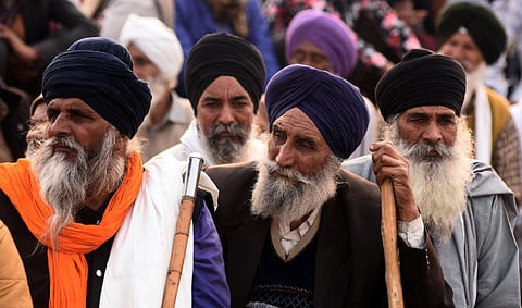Farmers during their agitation against new farm laws at Ghazipur border in New Delhi. (Photo | Parveen Negi, EPS)