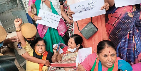 Police try to stop members of the BJP Mahila Morcha from protesting against the Dirty Hari movie at Ammavari temple, in Hyderabad on Wednesday.