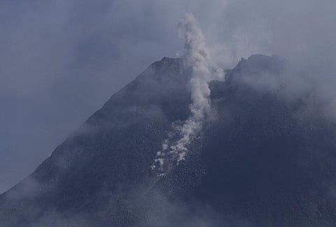 Mount Merapi spews volcanic materials from its crater as seen from Sleman, Yogyakarta, Indonesia, Thursday, Jan. 7, 2021. (Photo | AP)